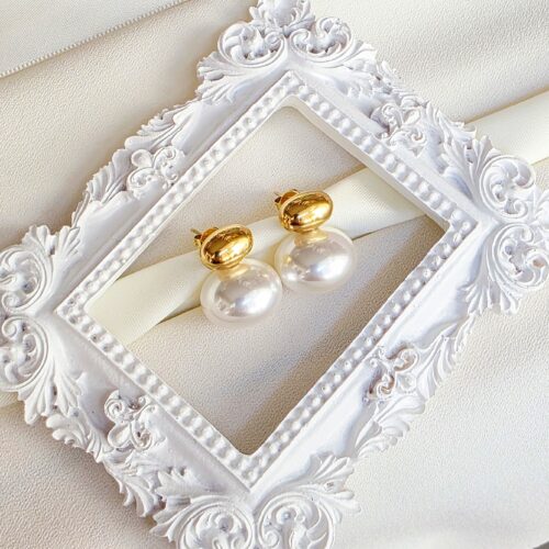 Boucles d'Oreilles " Victoire " perle baroque et sphère dorée